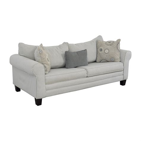 This well-designed will upgrade your living decor with square arms and genuine leather upholstery. . Raymour and flanigan sofas